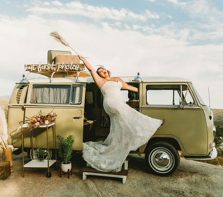 Plus Size Bride Wearing A Wedding Dress On Top Of A Van. Mobile Image.